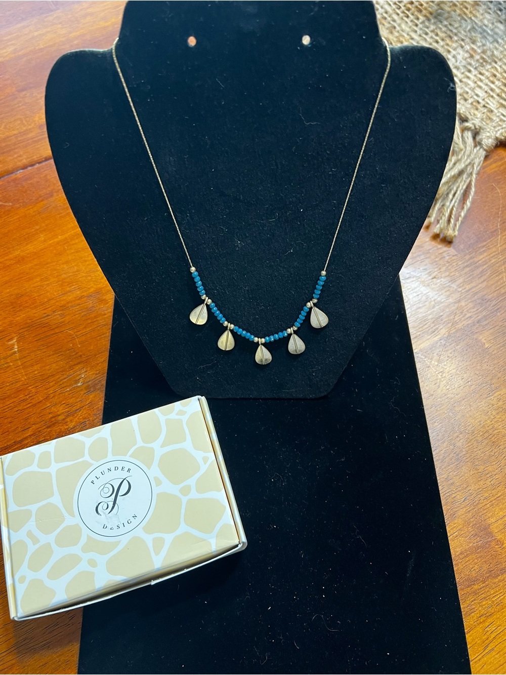 Plunder Gold Teardrop Charm Necklace with Blue Beads